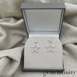 White gold and diamond star ear pendants