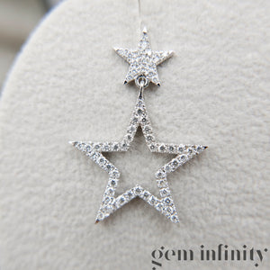 White gold and diamond star ear pendants