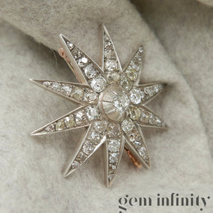 19th century star brooch silver on rose gold set with diamonds