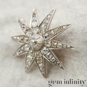 19th century star brooch silver on rose gold set with diamonds