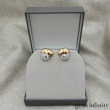Upload image to gallery, Pair of 1940s-50s gold and diamond ear clips
