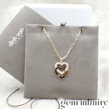 Upload image to gallery, Dinh Van 750 Gold and diamond heart handcuff pendant on chain
