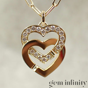 Dinh Van 750 Gold and diamond heart handcuff pendant on chain