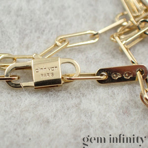Dinh Van 750 Gold and diamond heart handcuff pendant on chain