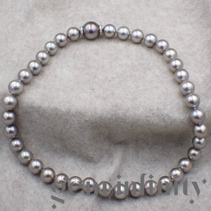 Collier de perles grises Tahiti, fermoir or gris et diamants