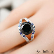Upload image to gallery, Mauboussin, ‘Ni naïve ni soumise vraie’, white gold ring set with sapphires and diamonds
