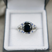 Upload image to gallery, Mauboussin, ‘Ni naïve ni soumise vraie’, white gold ring set with sapphires and diamonds
