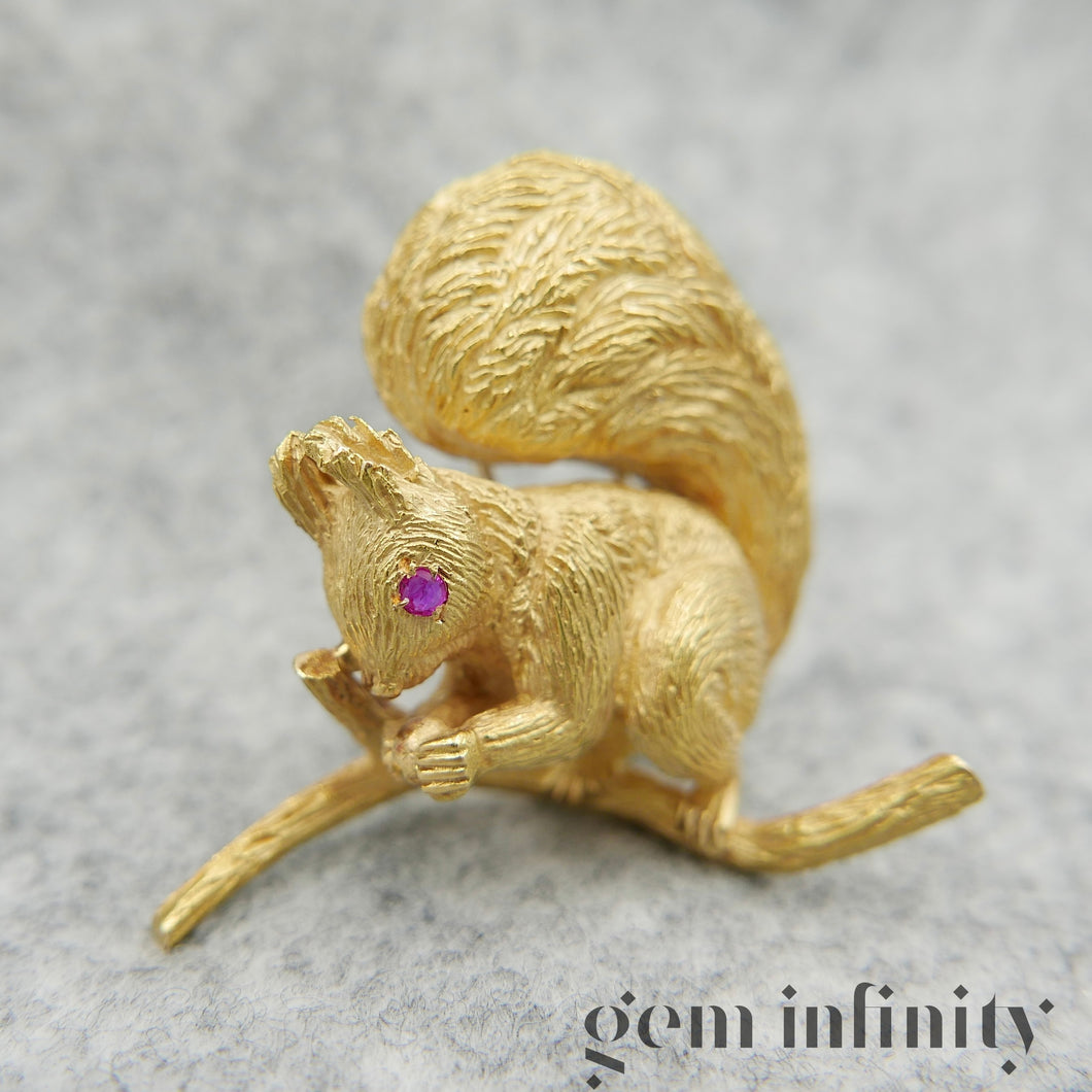 Hermès, gold and ruby squirrel brooch