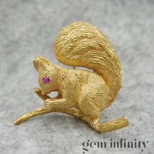Hermès, gold and ruby squirrel brooch