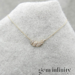 Gold and diamond angel wing bracelet