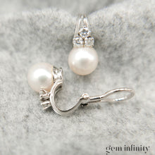 Upload image to gallery, Pair of white gold, pearl and diamond ear clips
