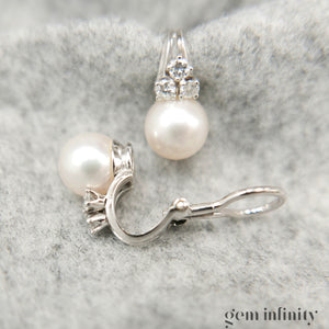 Pair of white gold, pearl and diamond ear clips