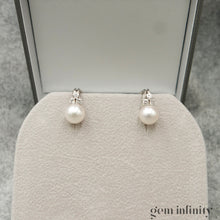 Upload image to gallery, Pair of white gold, pearl and diamond ear clips
