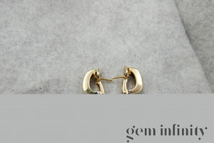 Pomellato, pair of yellow and white gold earrings set with diamonds