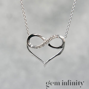 White gold 'infinite love' necklace set with diamonds