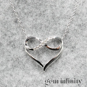White gold 'infinite love' necklace set with diamonds