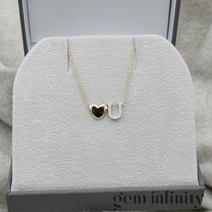 Yellow and white gold 'Love U' necklace set with diamonds