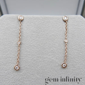 Pink gold and diamond pendant earrings