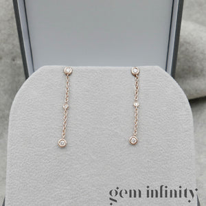 Pink gold and diamond pendant earrings