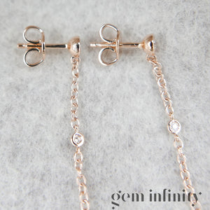 Pink gold and diamond pendant earrings