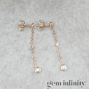 Pink gold and diamond pendant earrings