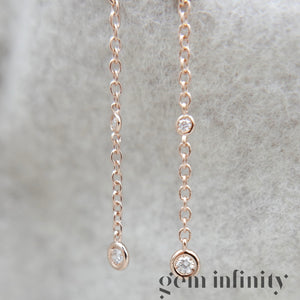 Pink gold and diamond pendant earrings