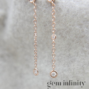 Pink gold and diamond pendant earrings