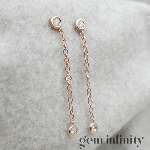 Pink gold and diamond pendant earrings