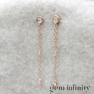 Pink gold and diamond pendant earrings