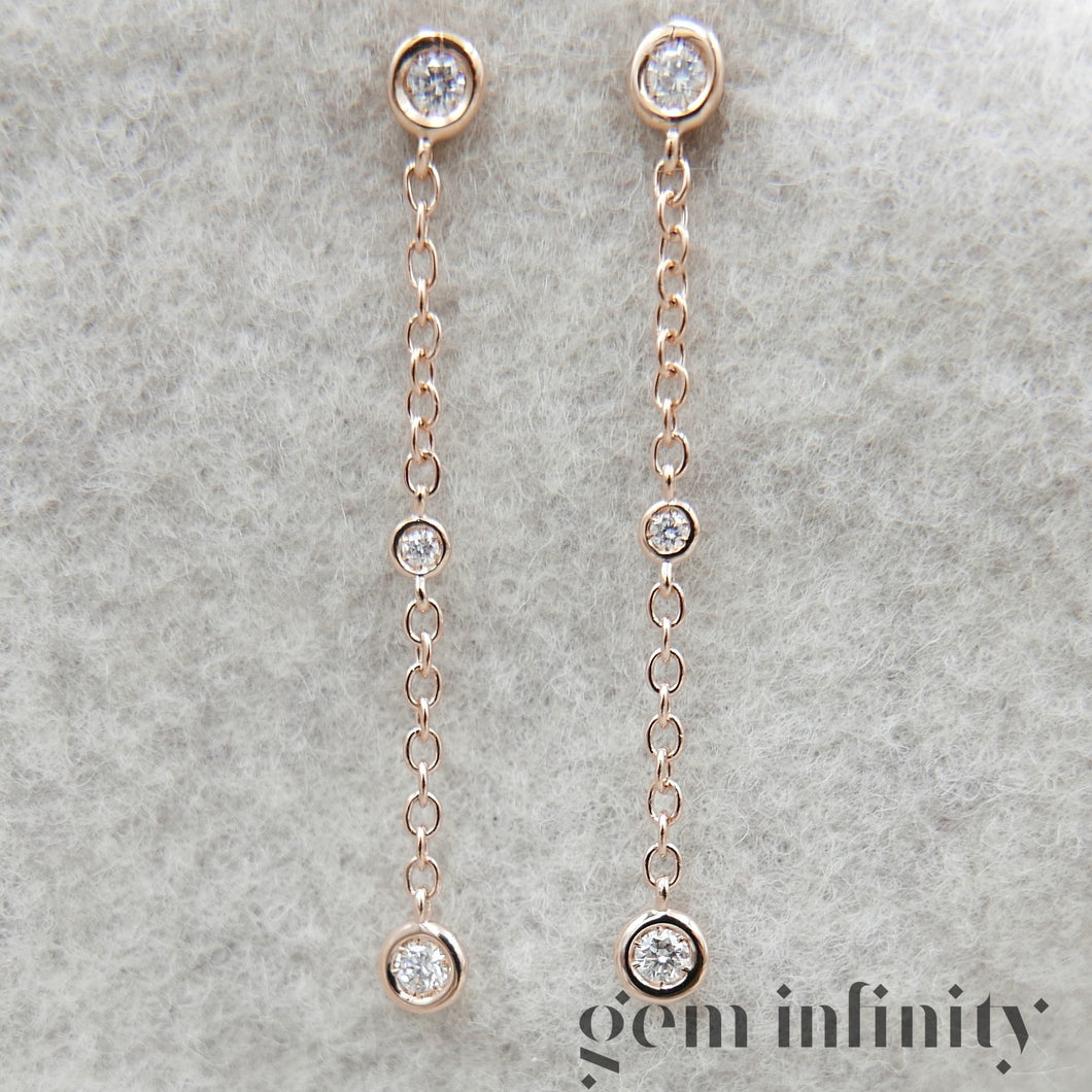 Pink gold and diamond pendant earrings