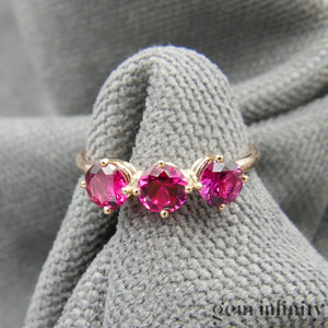 Pink gold and ruby ring