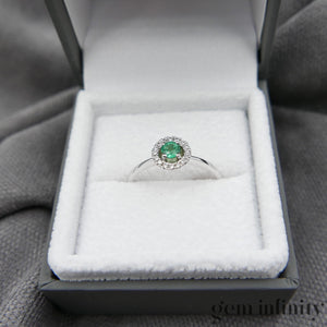 White gold emerald and diamond ring