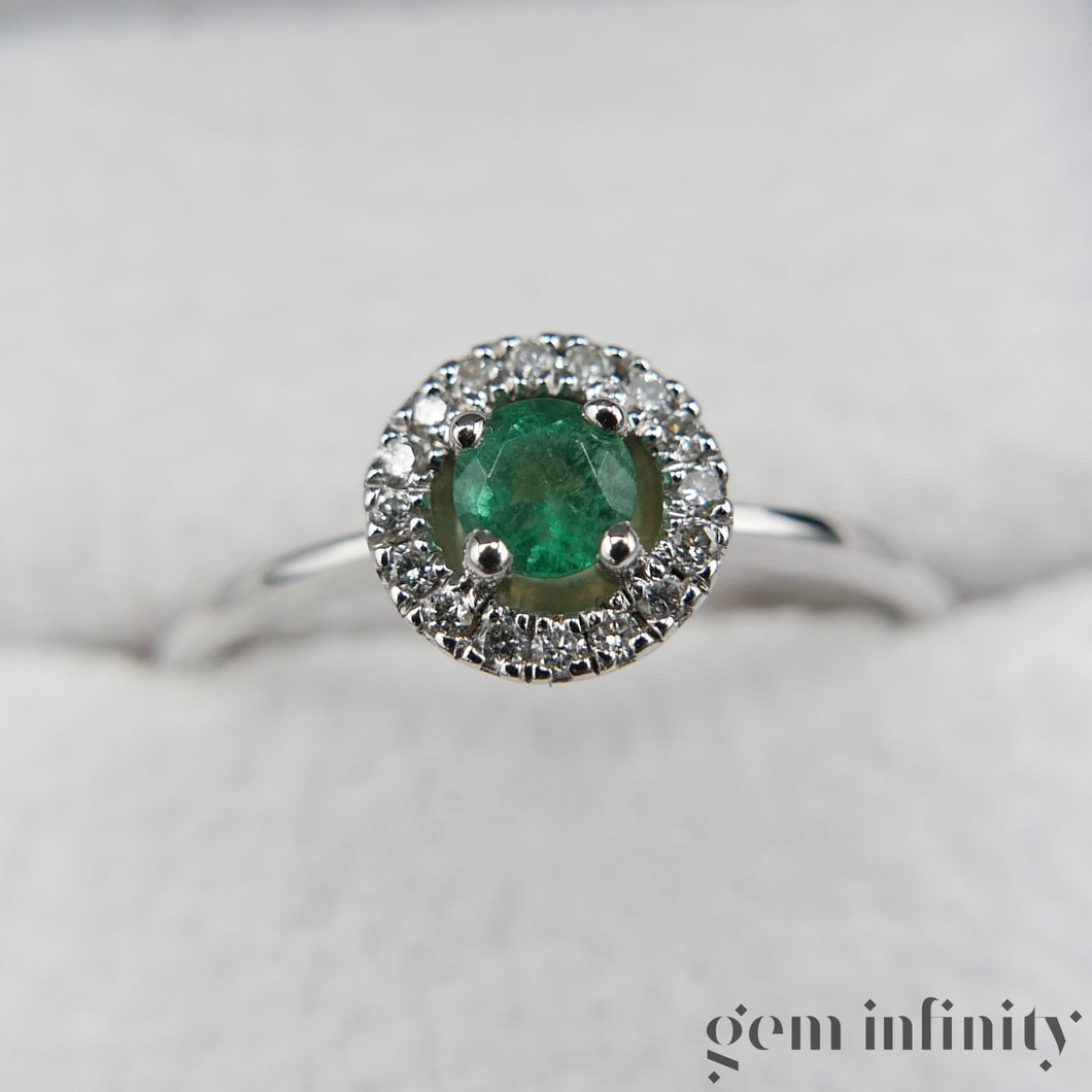 White gold emerald and diamond ring