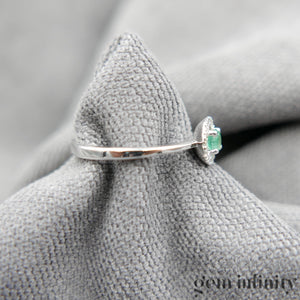 White gold emerald and diamond ring