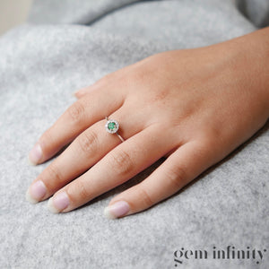 White gold emerald and diamond ring
