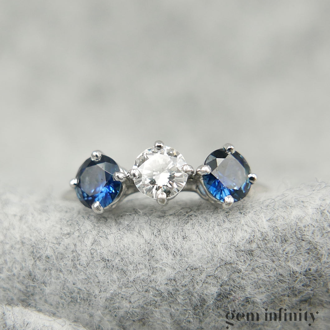 White gold, diamond and sapphire ring