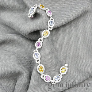 White gold bracelet, colored sapphires and diamonds