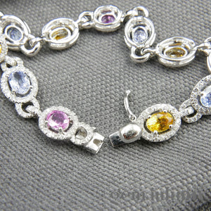 White gold bracelet, colored sapphires and diamonds