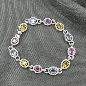 White gold bracelet, colored sapphires and diamonds