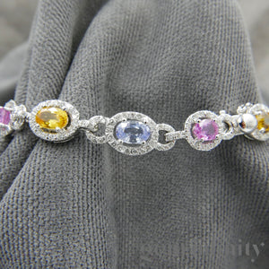 White gold bracelet, colored sapphires and diamonds