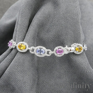 White gold bracelet, colored sapphires and diamonds