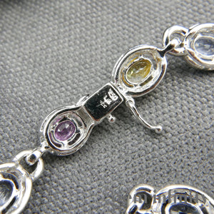 White gold bracelet, colored sapphires and diamonds
