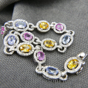 White gold bracelet, colored sapphires and diamonds