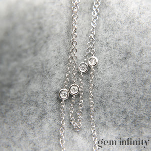 Collier or gris et diamants