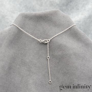 Collier or gris et diamants