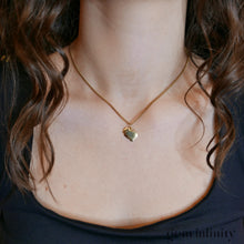 Upload image to gallery, Pomellato, yellow gold Dodo pendant on a chain

