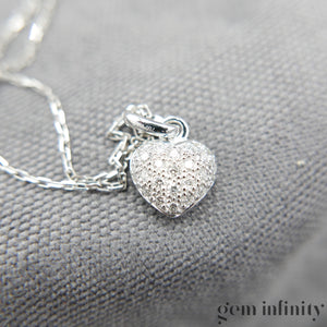 White gold and diamond pendant necklace