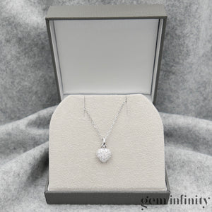 White gold and diamond pendant necklace
