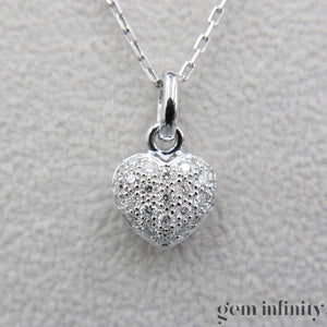 White gold and diamond pendant necklace