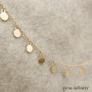 Yellow gold tassel necklace